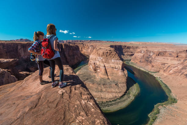 istock Two tourist enjoy Colorado river 689451074