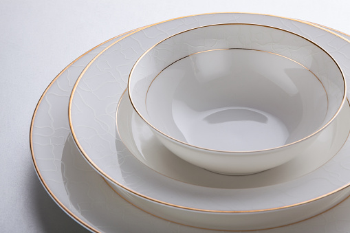 White dinner plates with geometric pattern