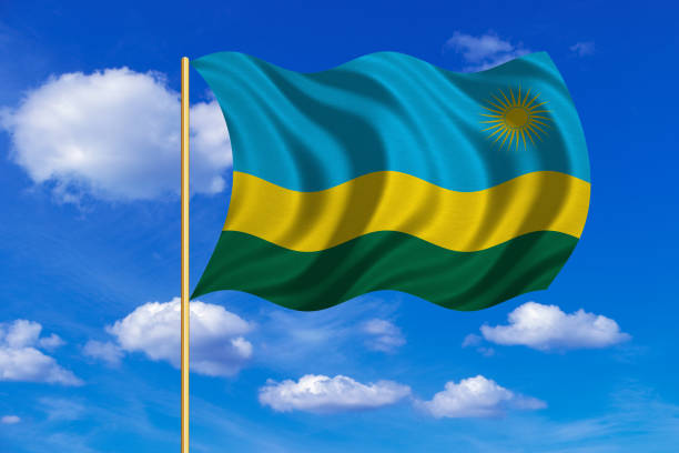 istock Flag of Rwanda waving on blue sky background 689472728