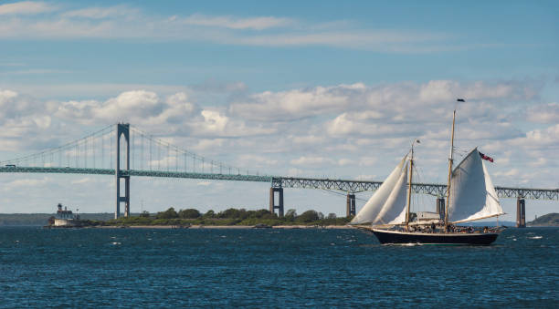 istock Sailing Ship, Newport Bridge, and Rose Island Lighthouse 689478054