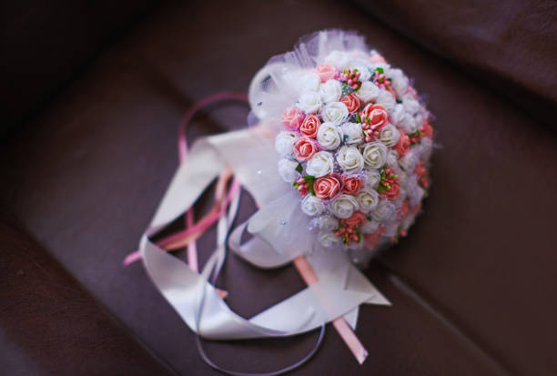 Bride holding flower bouquet