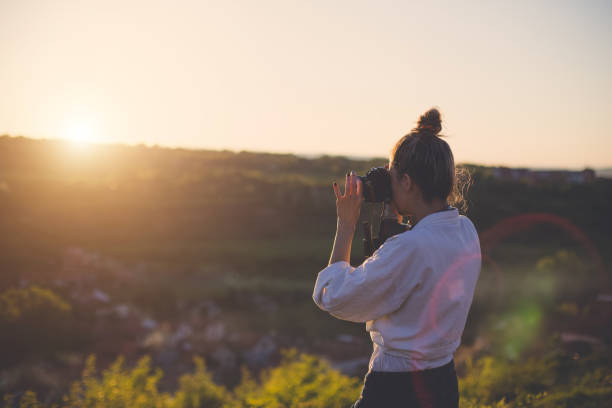 istock Female with vintage camera 689508602