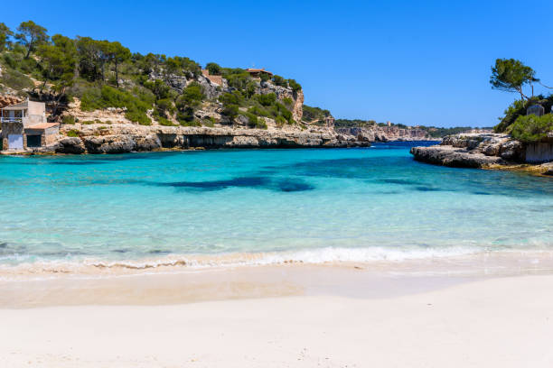istock Cala Llombards - beautiful beach in bay of Mallorca, Spain 689514892