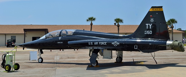 Panama City, USA - April 22, 2017: A U.S. Air Force T-38 Talon on the runway at Tyndall Air Force Base in Florida. This T-38 is used as an aggressor trainer for the 325th Fighter Wing.