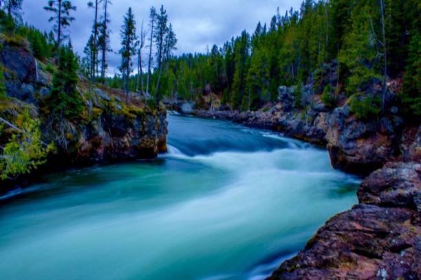 istock flowing river  of Yellowstone national park 689524920