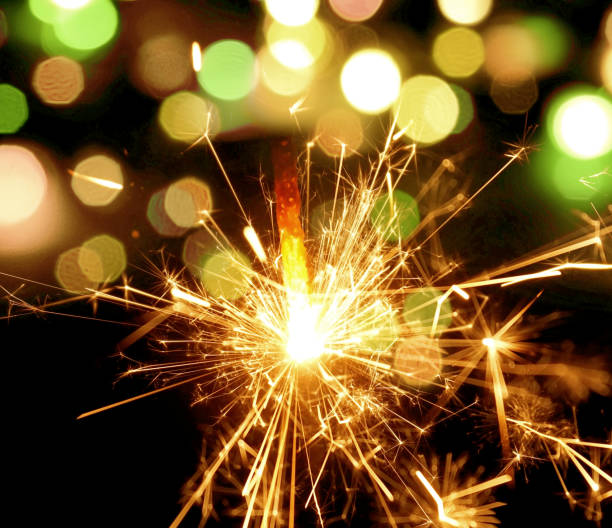 istock holiday background with a sparkler 689527178