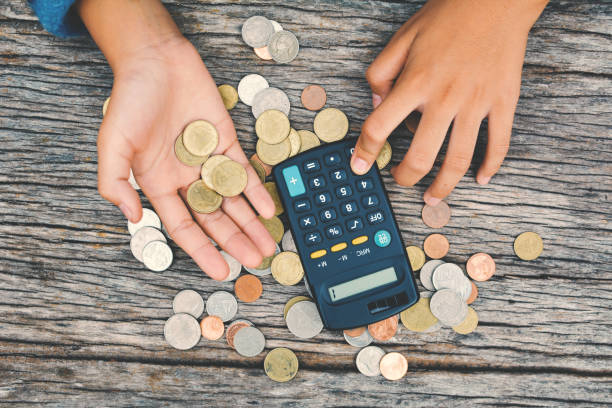 istock Hands girl holding coin selective and soft focus hipster tone 689527608
