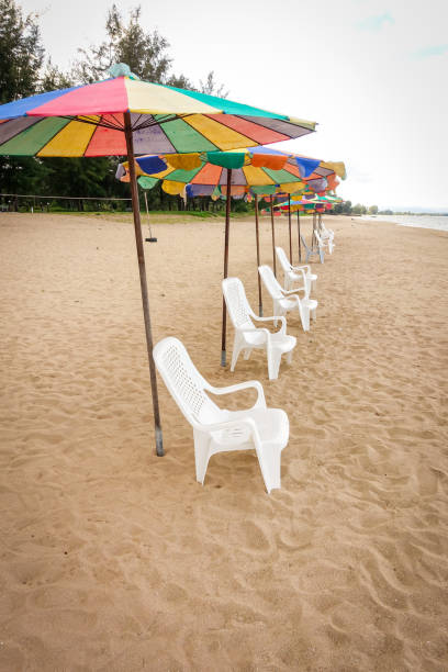istock Beach chair and umbrella 689527868