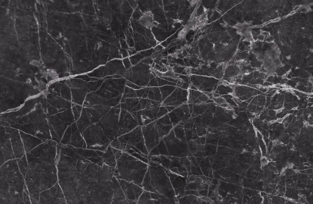 istock Black and dark marble texture with delicate veins 689528546