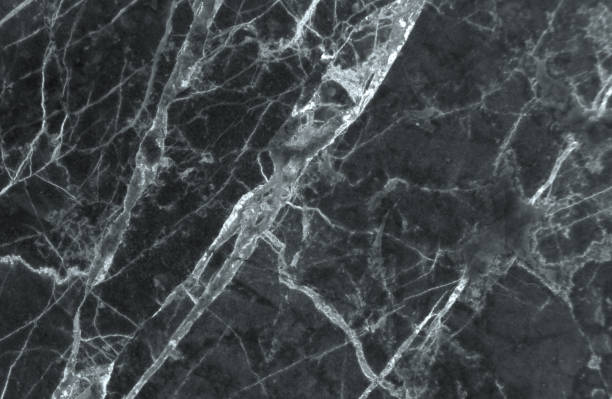 istock Black and dark marble texture with delicate veins 689528680