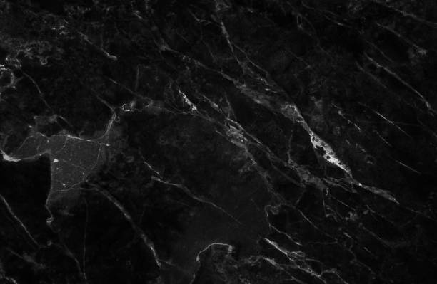 istock Black and dark marble texture with delicate veins 689530812