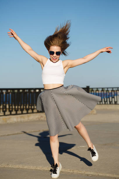istock Girl on the city pier. 689531218