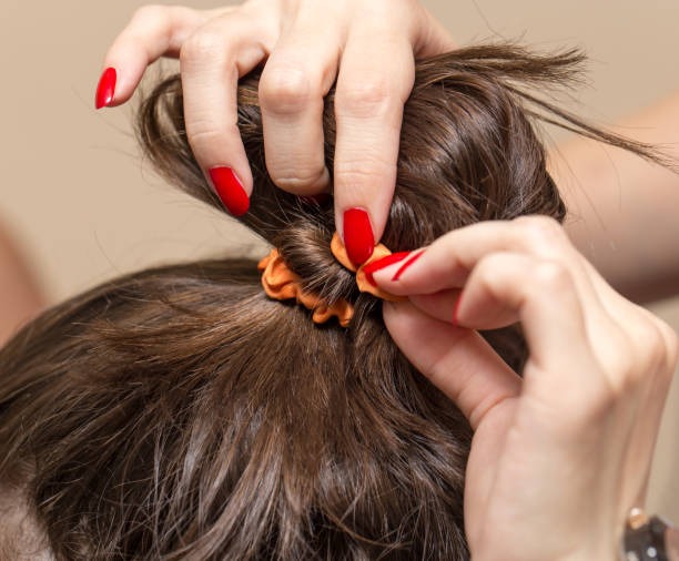 istock braided pigtails in the beauty salon 689536692