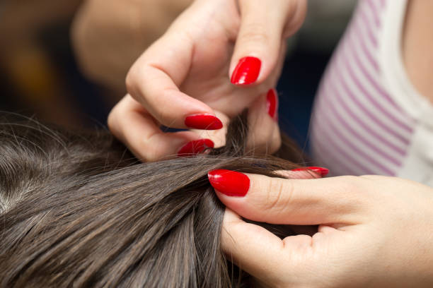istock braided pigtails in the beauty salon 689536826