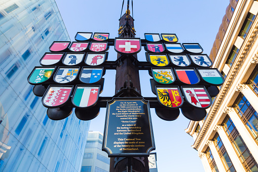 London, England - 9 April 2017 - Cantonal Tree displays 26 Coats of Arms of Switzerland in London, England on April 9, 2017