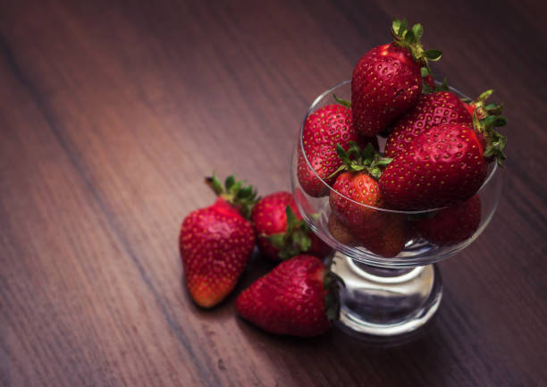 istock Large strawberries in a glass 689548254