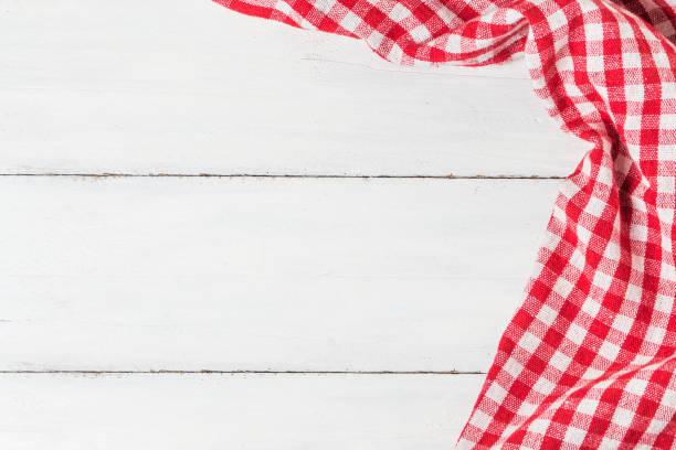 istock empty wooden table and cloth red napkin 689551636