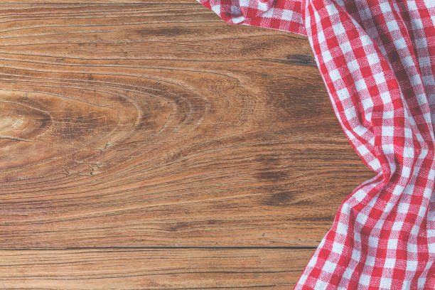 istock empty wooden table and cloth red napkin 689551738