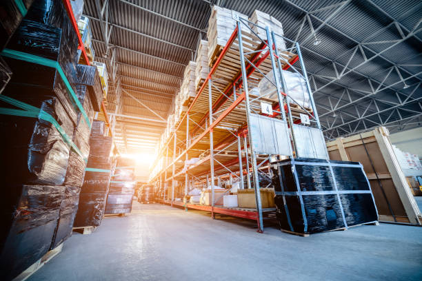 istock Long shelves with a variety of boxes and containers 689554502