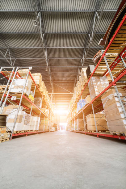 istock Long shelves with a variety of boxes and containers 689554700