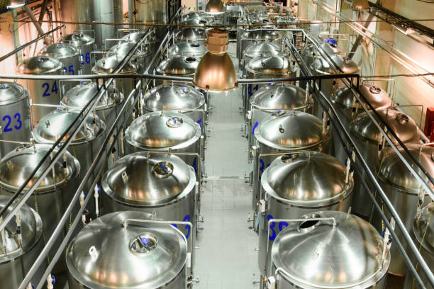 istock Rows of glossy metal tanks 689554988