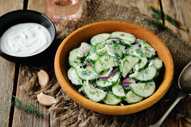 istock Greek yogurt red onion cucumber salad 689558594