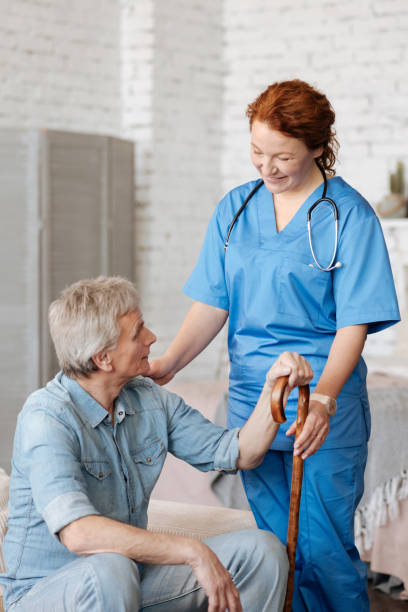 istock Graceful qualified doctor happy assisting her mature patient 689560928