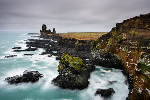 Amazing Icelandic landscape at Londrangar Cliffs. Beautiful seascape in Iceland