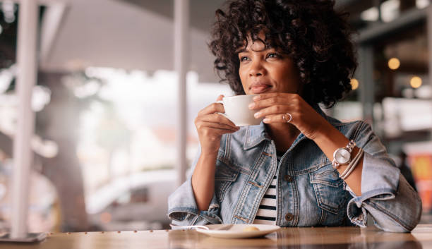 istock Pensive young female having coffee in a restaurant 689582976