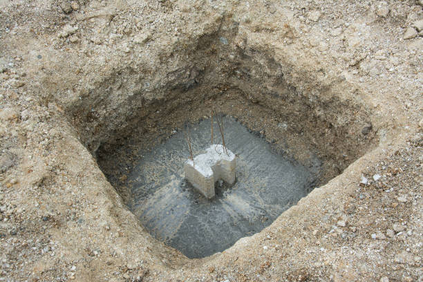 istock concrete piles in ground for foundation at construction site 689621956