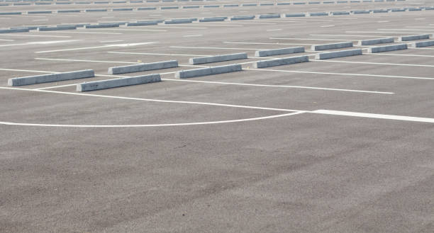 istock Car parking lot with white mark 689622332