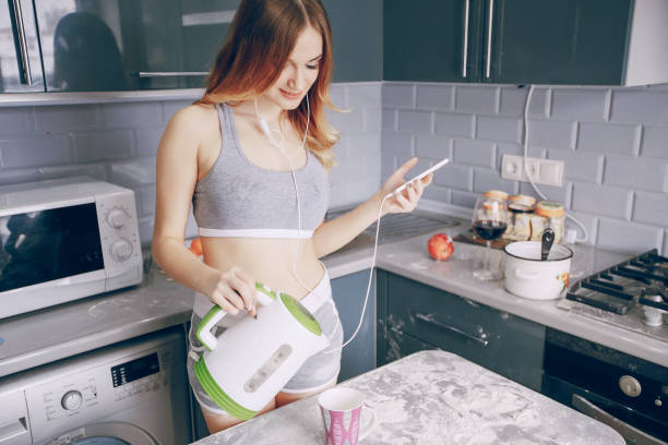 istock Girl in the kitchen 689626308