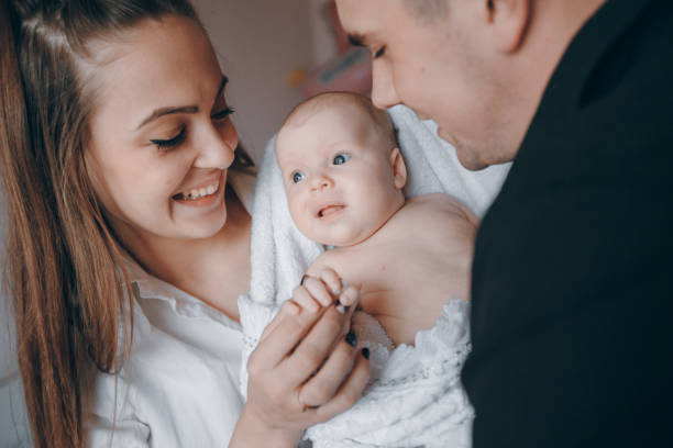 istock young family with infant 689629172