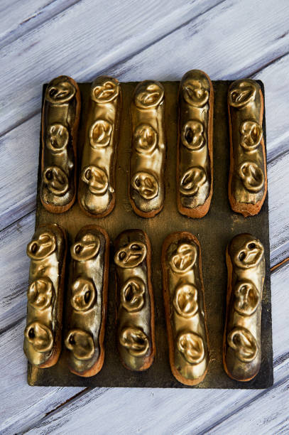 Eclairs, filled with Golden glaze.a work of culinary art