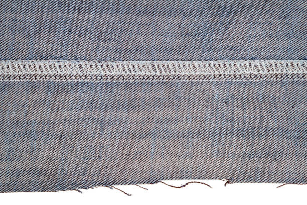 istock Piece of blue jeans fabric 689633680