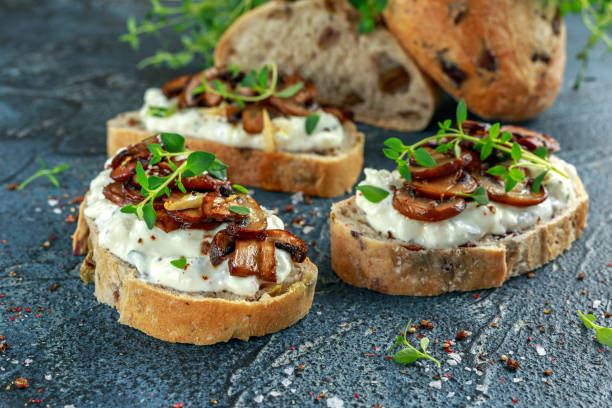 istock Garlic mushroom toast with creamy herbed ricotta chees spread 689636240