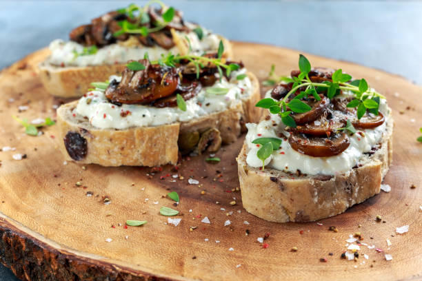 istock Garlic mushroom toast with creamy herbed ricotta chees spread 689636256