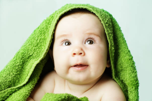 istock Happy baby with bath towel 689639586