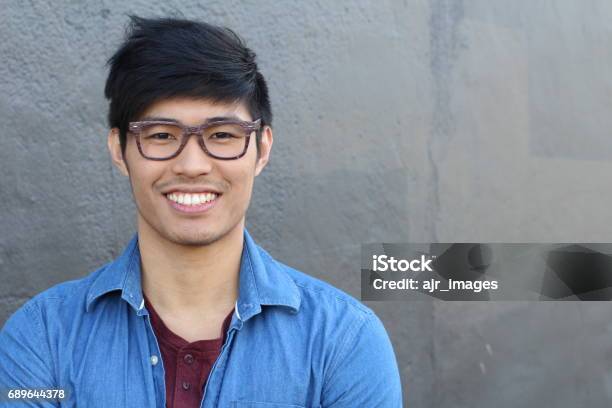 Asian Man Portrait Smiling Isolated With Copyspace Stock Photo - Download Image Now - Men, University Student, Headshot