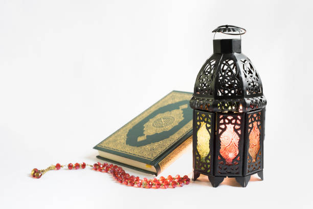 istock Holy Quran with Lantern and prayer beads 689644390