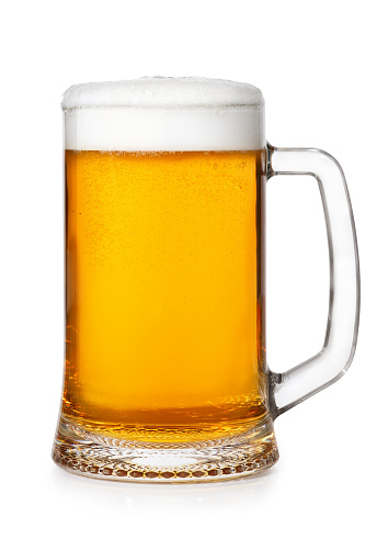 fresh beer mug with foam and bubbles isolated on white background. Light unbottled wheat beer in transparent glass mug