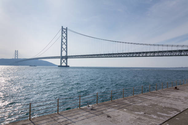 istock Akashi Kaikyo suspension bridge cross Kobe ocean 689657660