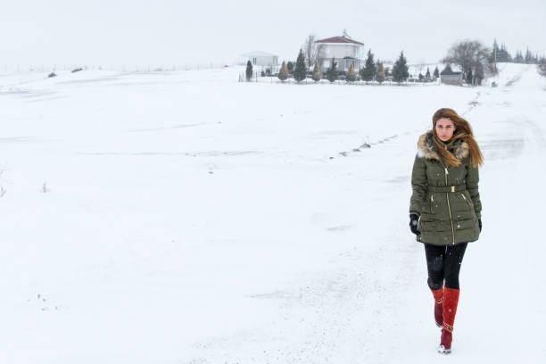 istock Girl in the snow 689666442