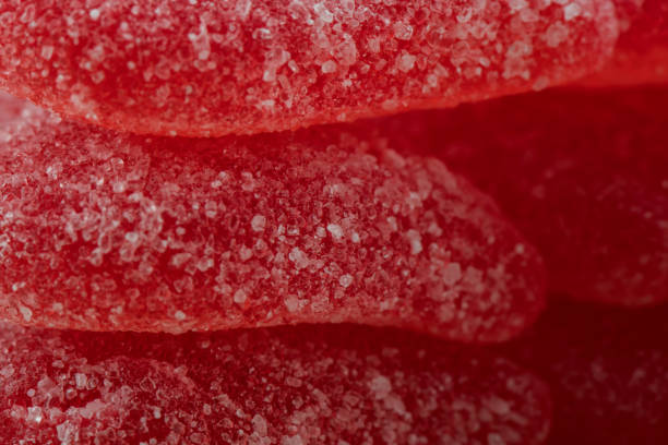 istock Macro of Sugar on Red Gummy Hearts Stacked 689674494