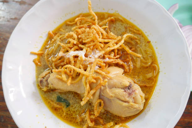 istock Khao Soi Recipe, Curried Noodle Soup with Chicken 689691044
