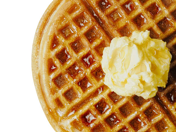 istock traditional classic belgium american waffle with butter and maple syrup 689698686
