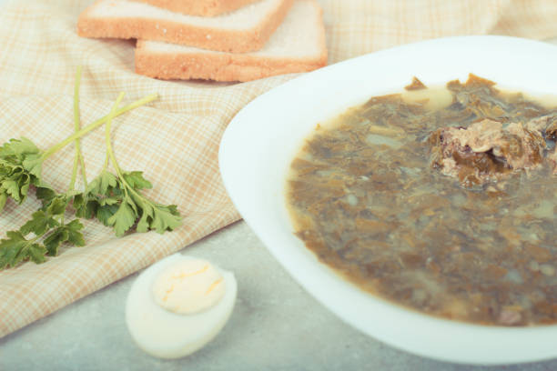 istock Green borsch with sorrel and boiled eggs 689707102