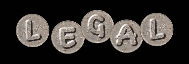 istock LEGAL – Coins on black background 689725458