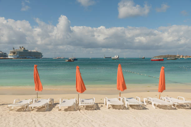 istock Colorful umbrellas on the tropical beach 689725860