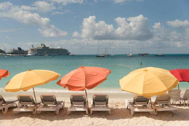 istock Colorful umbrellas on the tropical beach 689726144